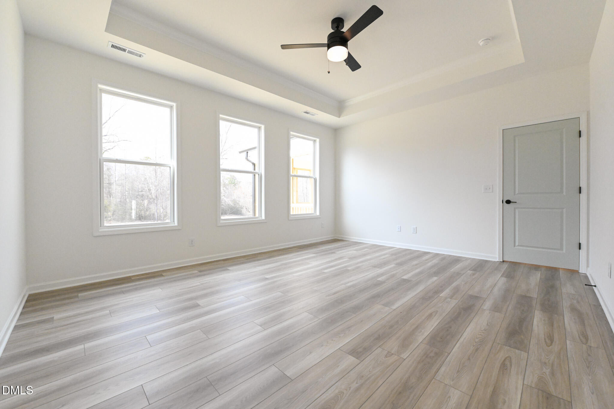 72 South Bream Court Angier, NC 27501 - Photo 26 of 44 a view of empty room with wooden floor and fan