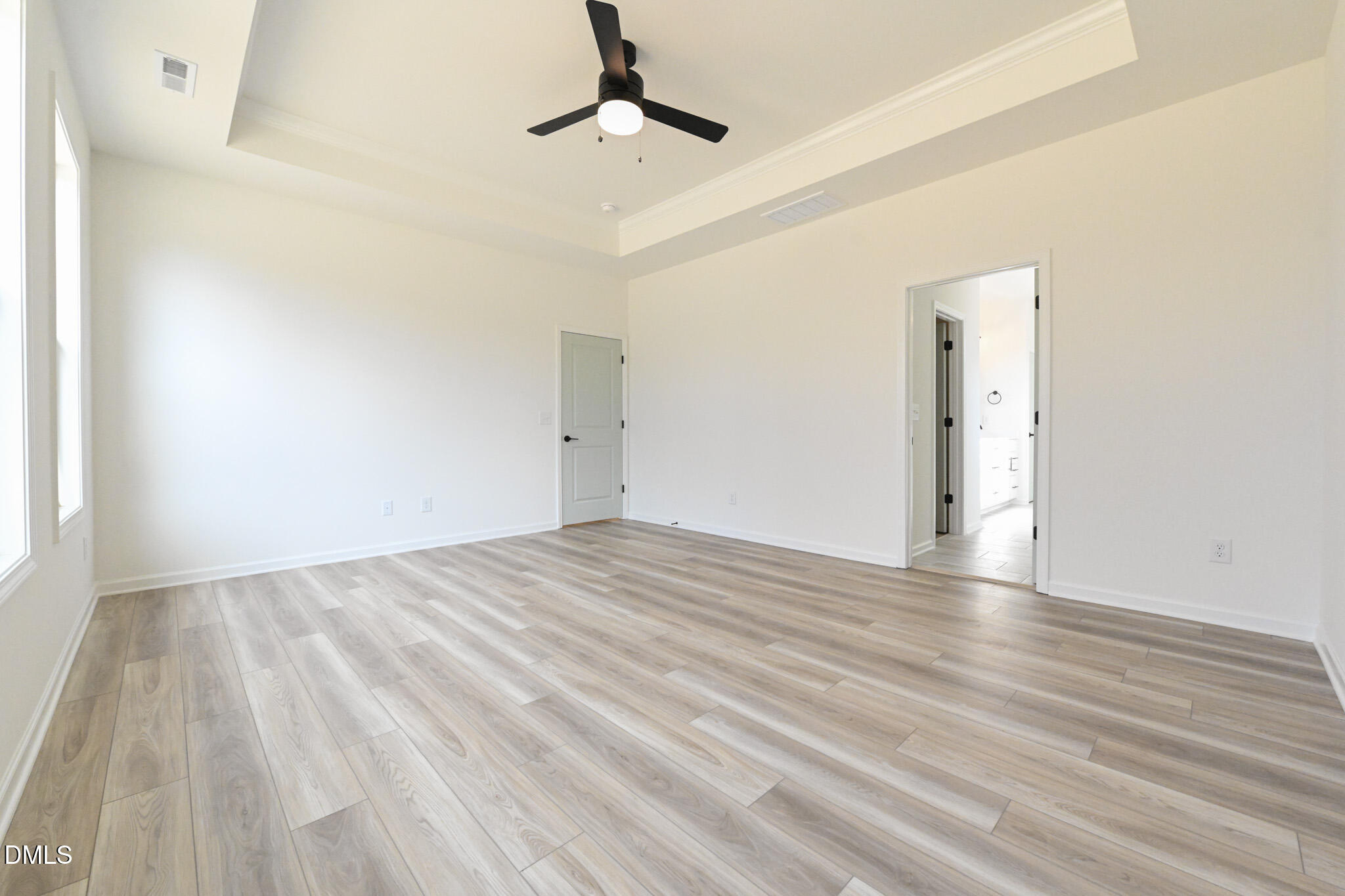 72 South Bream Court Angier, NC 27501 - Photo 27 of 44 a view of empty room with wooden floor and fan