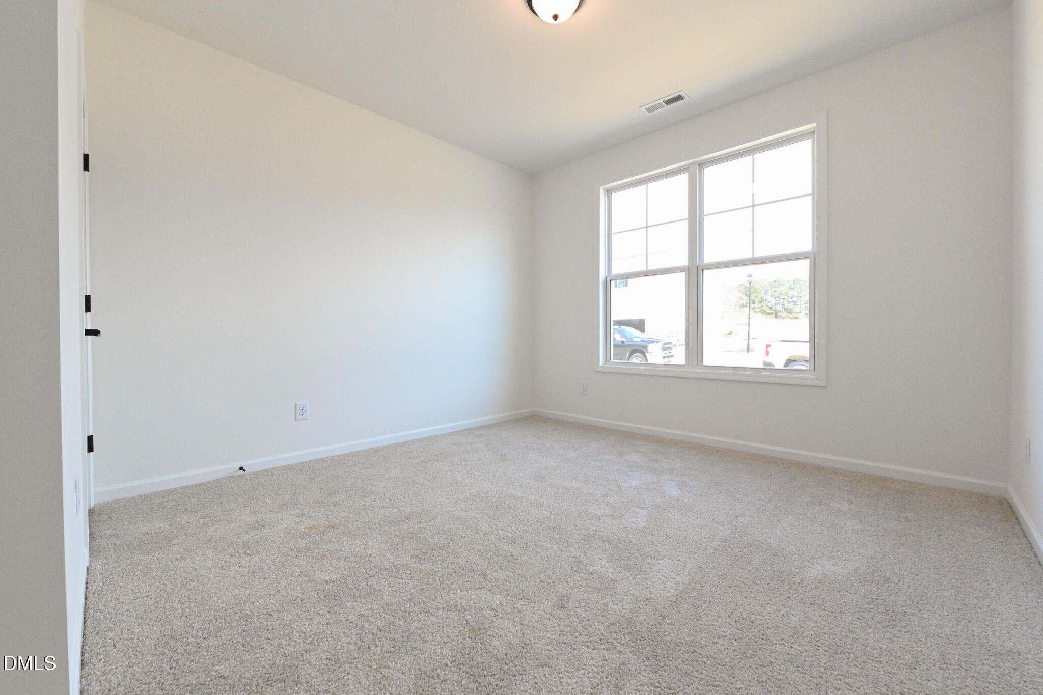 72 South Bream Court Angier, NC 27501 - Photo 31 of 44 an empty room with a window