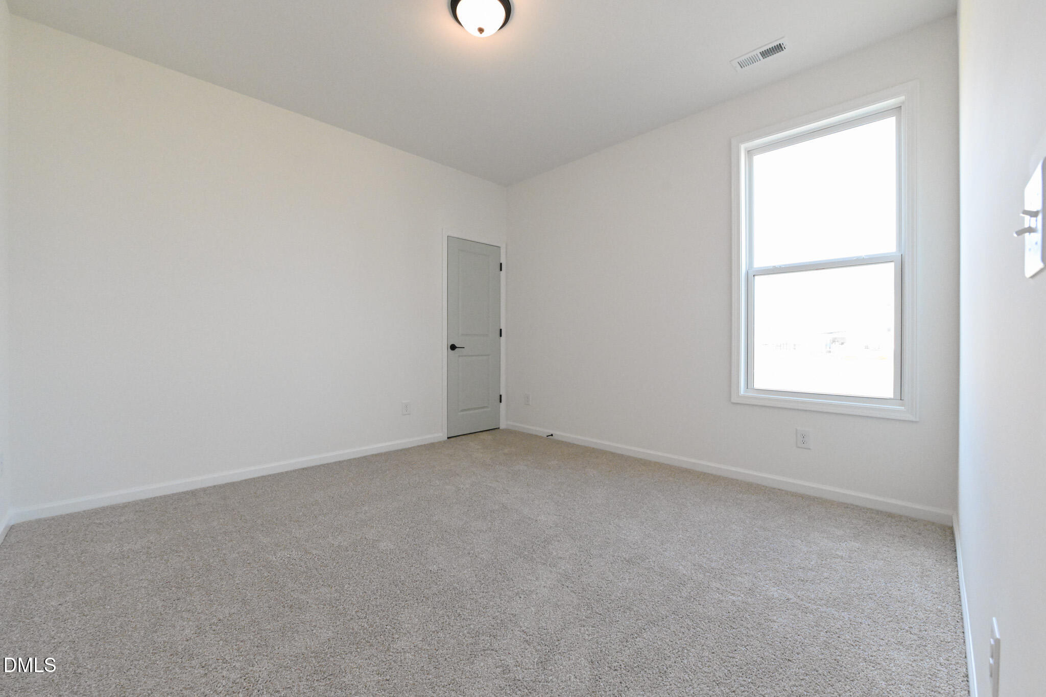 72 South Bream Court Angier, NC 27501 - Photo 36 of 44 an empty room with a window