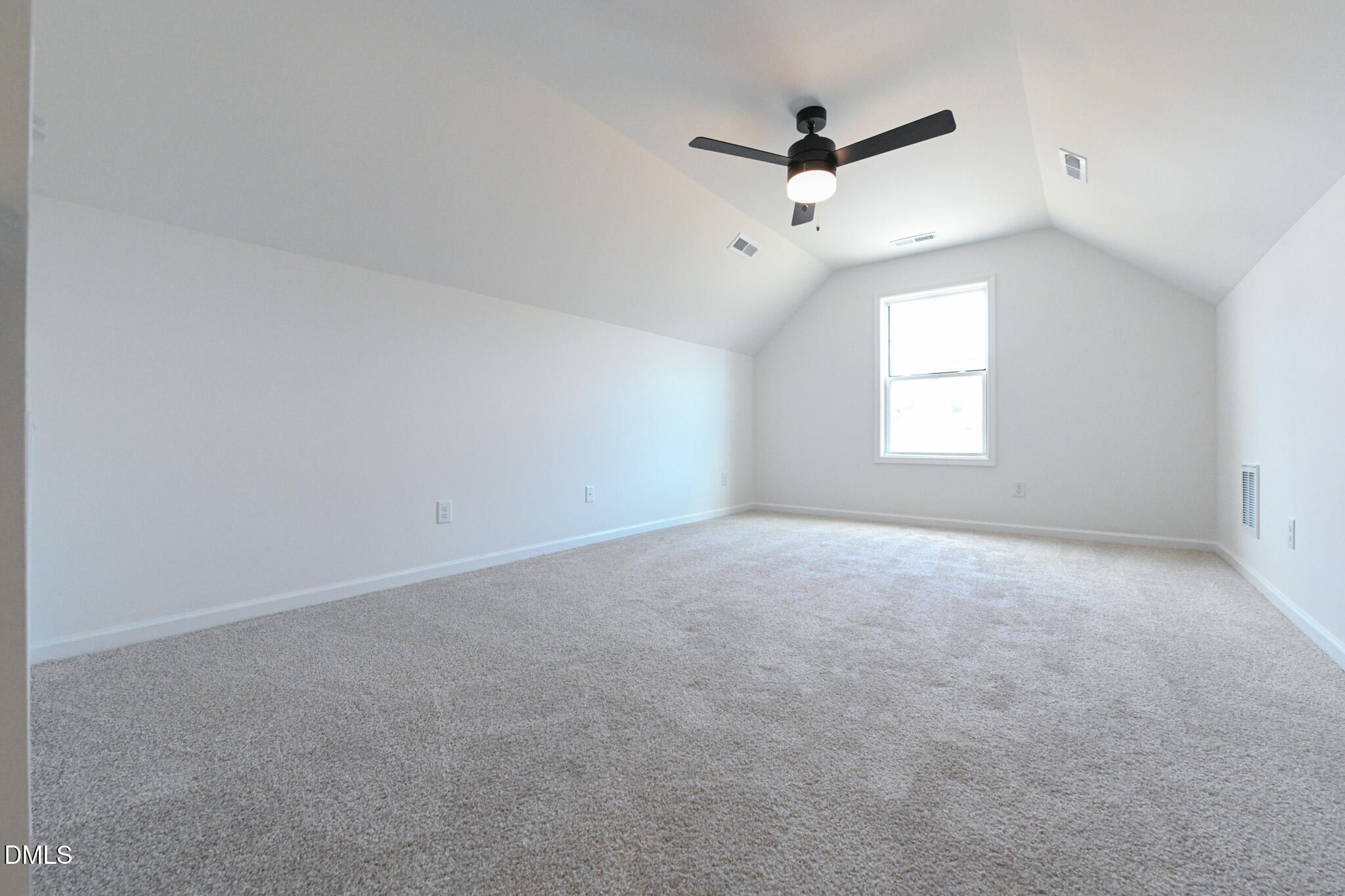 72 South Bream Court Angier, NC 27501 - Photo 37 of 44 an empty room with a ceiling fan and window