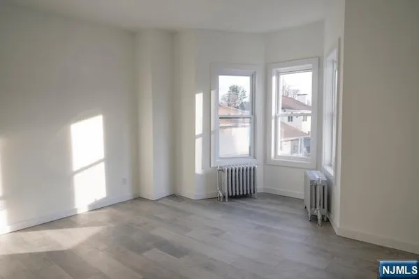 an empty room with windows