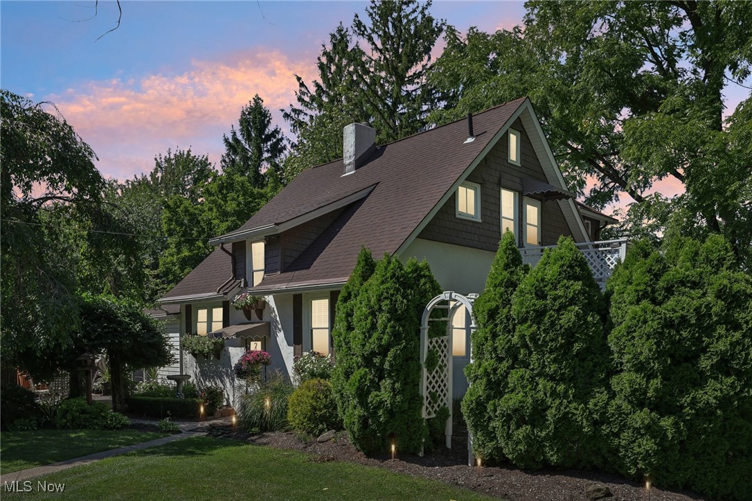 View of front of home featuring a yard