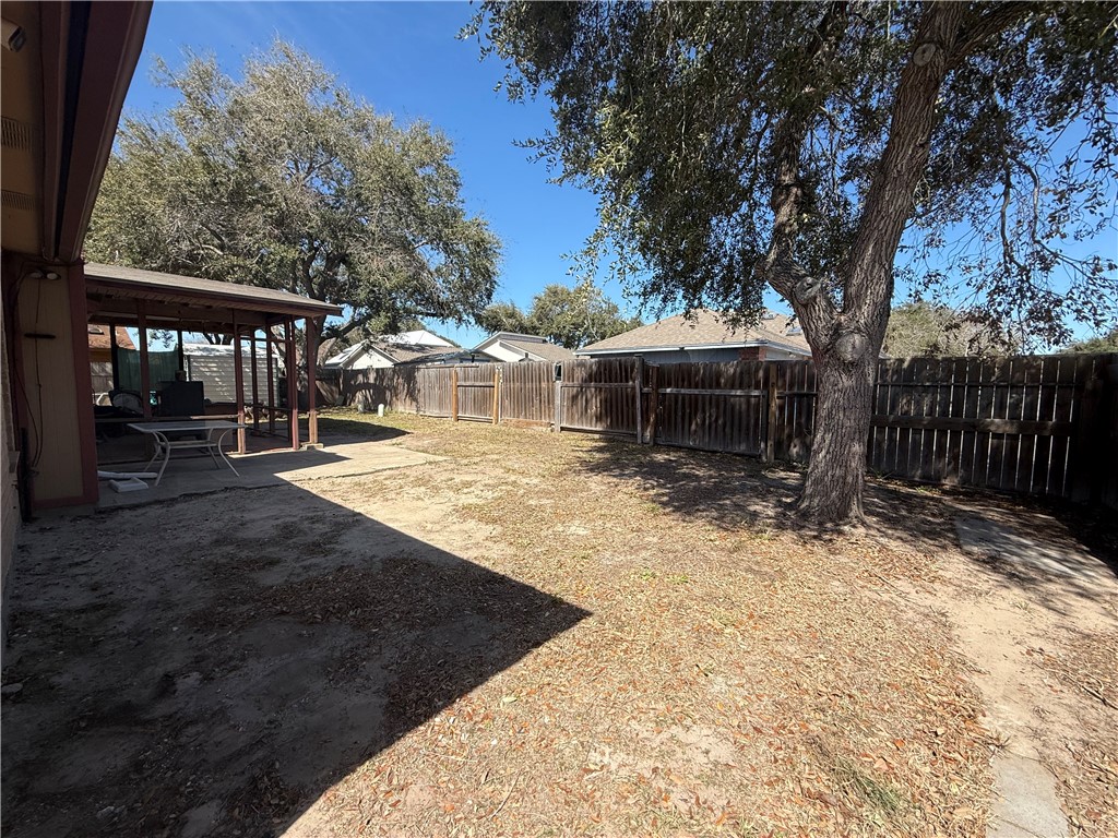 902 St Timothy Street Corpus Christi, TX 78418 - Photo 23 of 24 a view of a house with backyard and sitting area