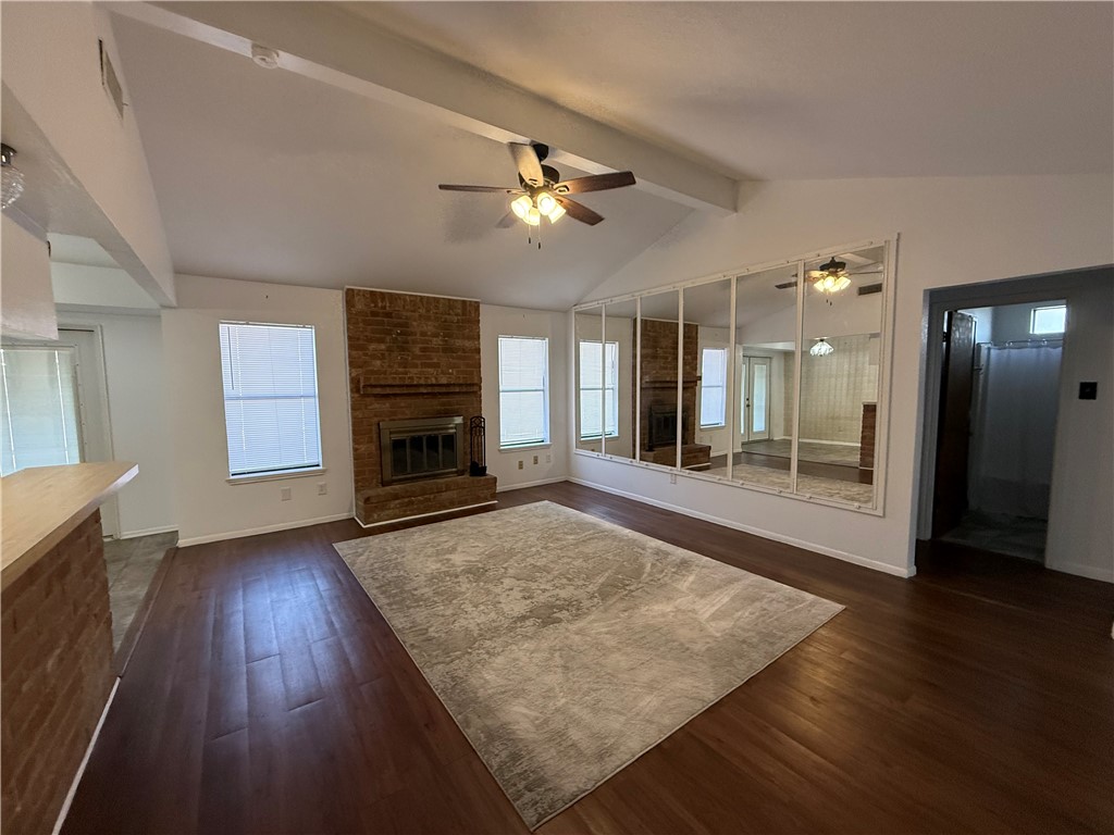902 St Timothy Street Corpus Christi, TX 78418 - Photo 4 of 24 a view of a livingroom with wooden floor and a kitchen space