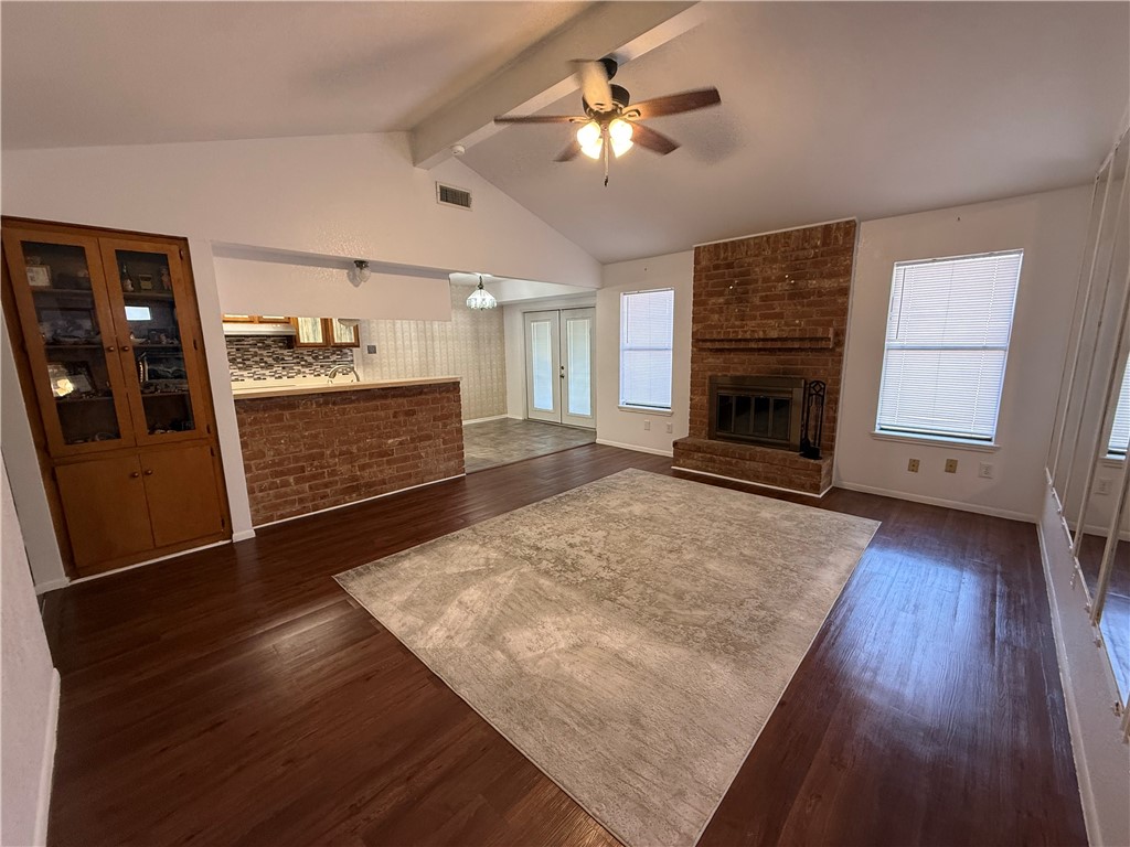 902 St Timothy Street Corpus Christi, TX 78418 - Photo 6 of 24 a living room with furniture and a fireplace