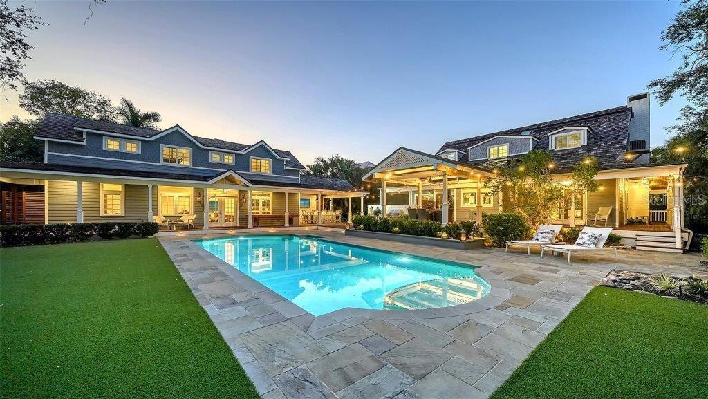 a view of a house with a swimming pool