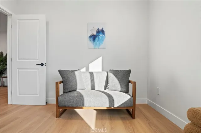 a kitchen with appliances a sink and cabinets