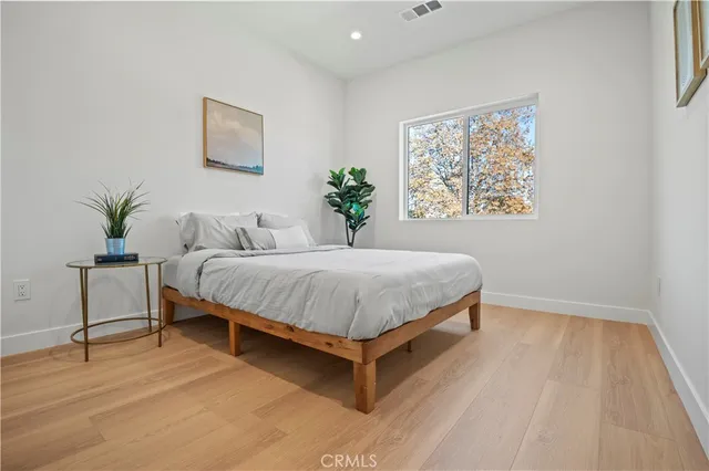 a kitchen with a stove and a refrigerator