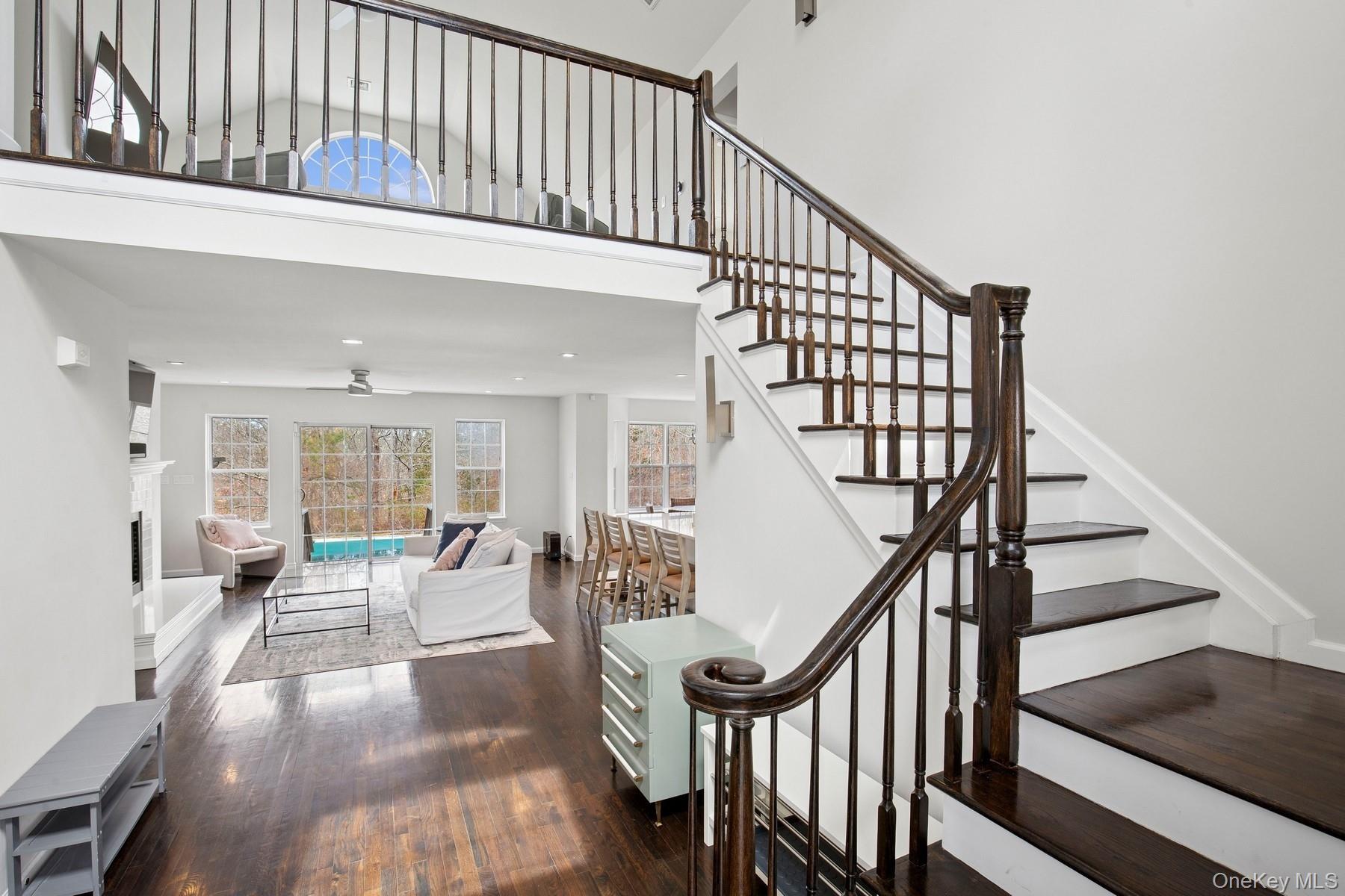 71 Old Canoe Place Road Hampton Bays, NY 11946 - Photo 28 of 34 a view of entryway livingroom and hall with wooden floor