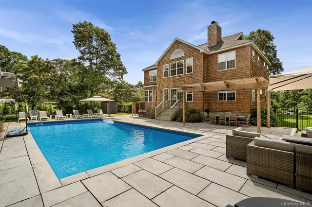 a view of a house with swimming pool