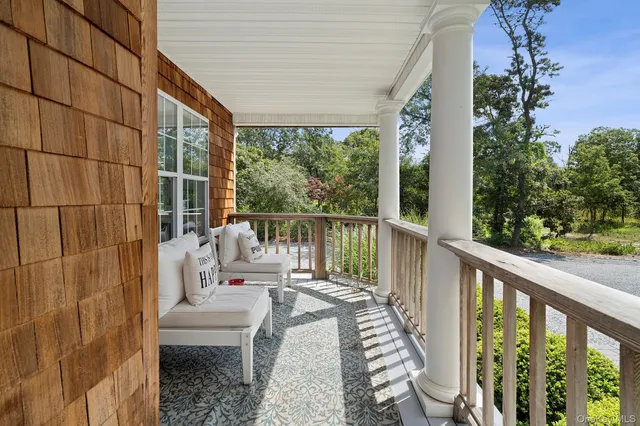 a view of balcony with furniture