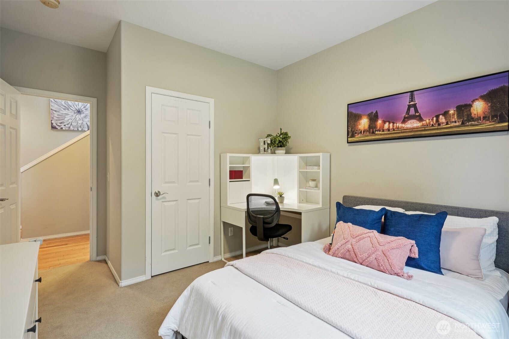 206 Pasco Drive Northeast Renton, WA 98059 - Photo 13 of 40 a bedroom with a bed and wooden floor