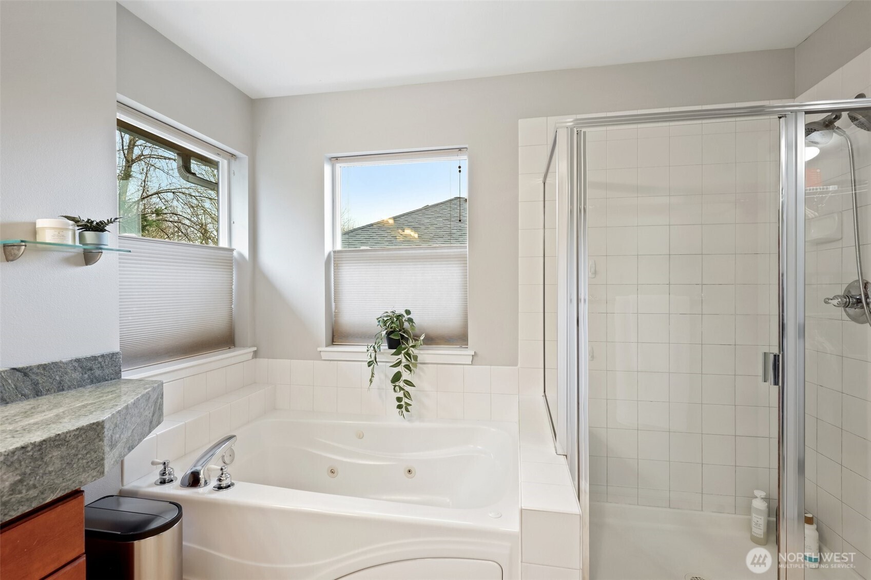 206 Pasco Drive Northeast Renton, WA 98059 - Photo 23 of 40 a white bath tub sitting next to a white toilet