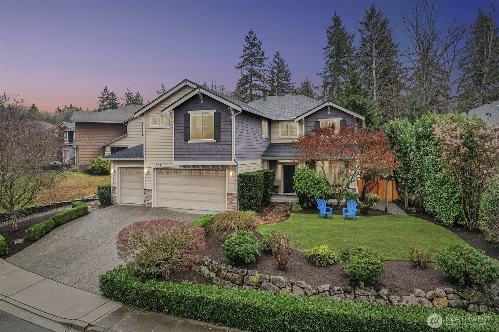 206 Pasco Drive Northeast Renton, WA 98059 - Photo 38 of 40 a front view of a house with a yard and garage