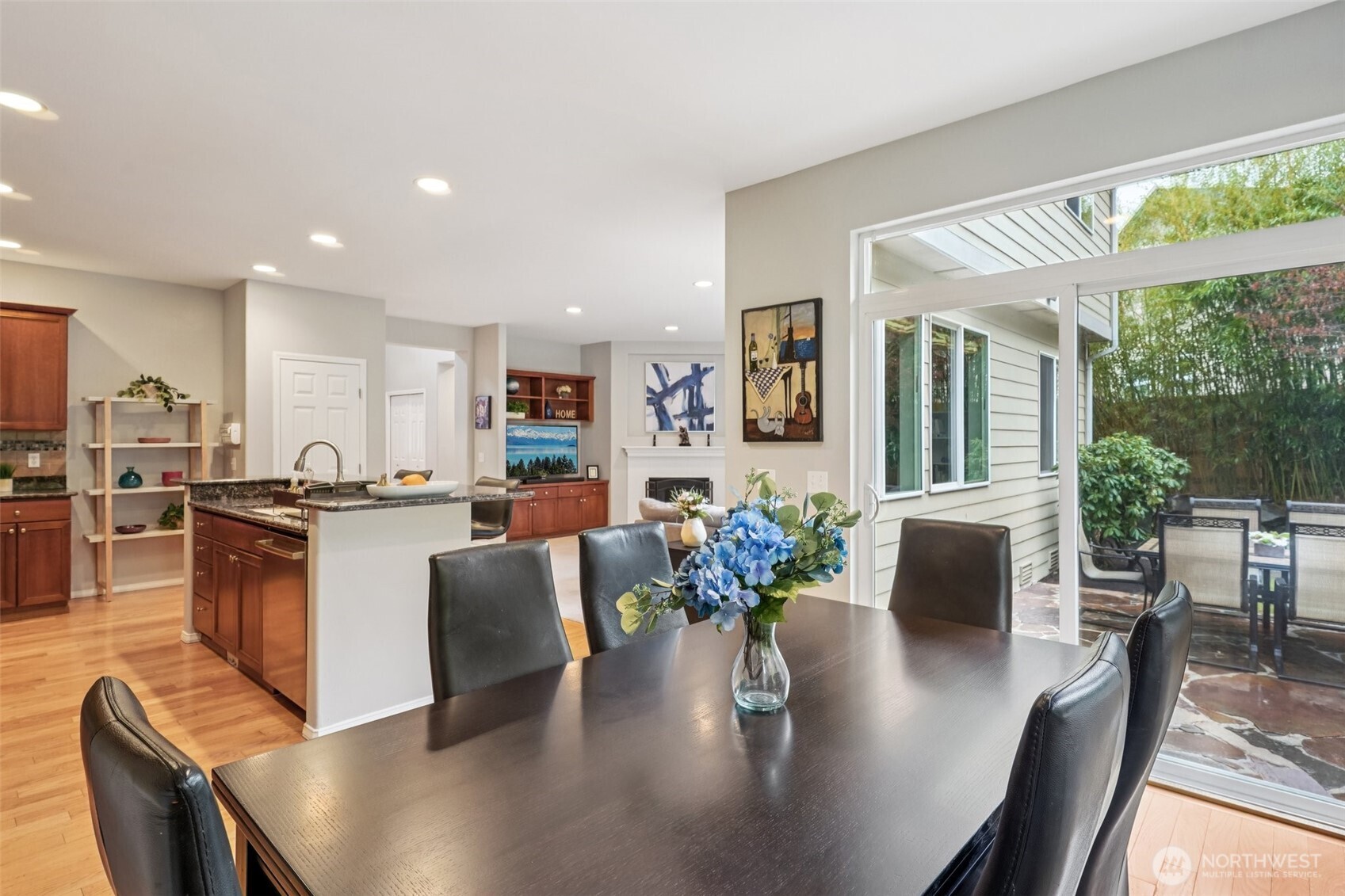 206 Pasco Drive Northeast Renton, WA 98059 - Photo 8 of 40 an open kitchen with dining table and chairs