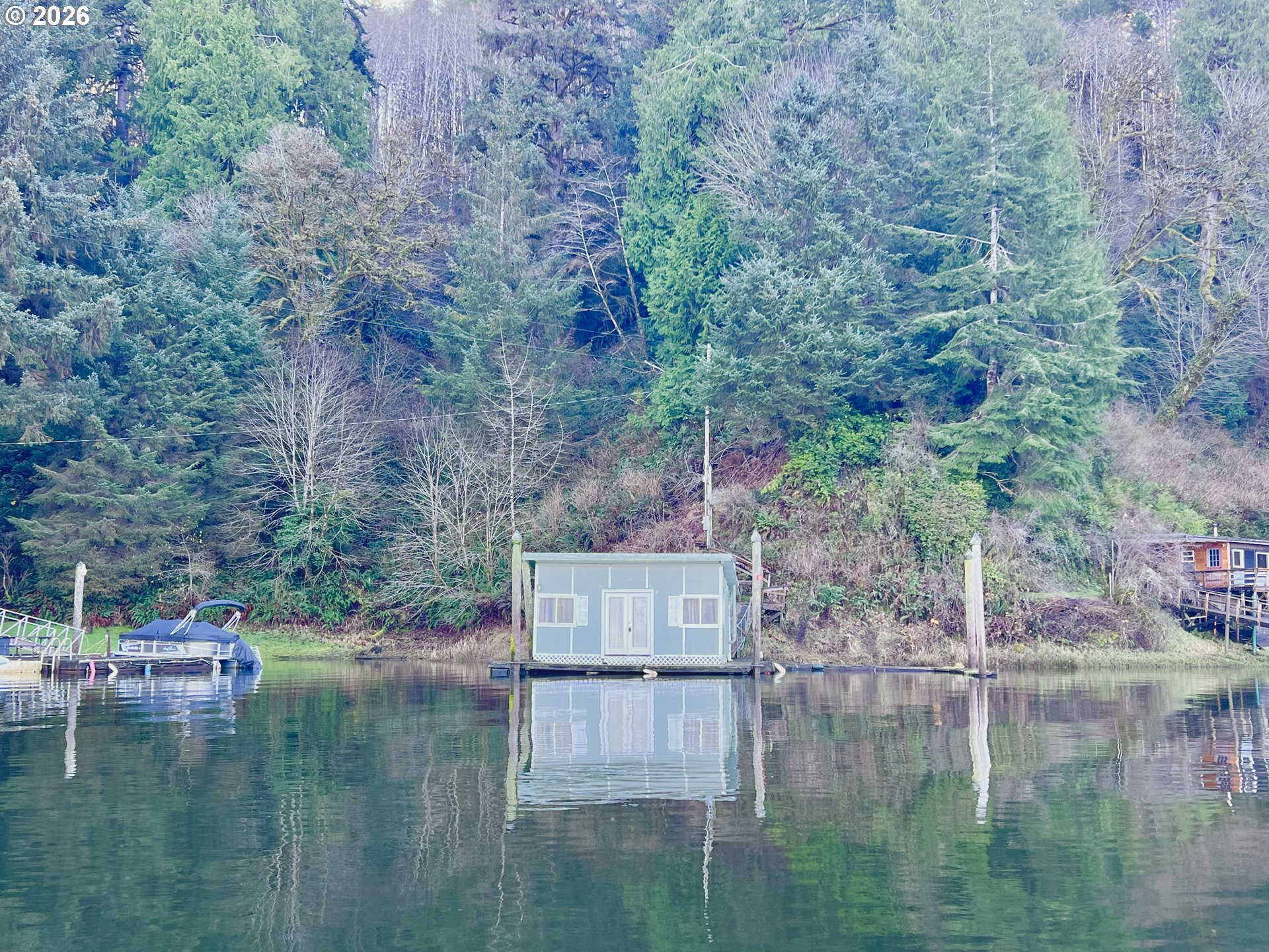 515 North Tenmile Lakeside, OR 97449 - Photo 12 of 20 a swimming pool with trees in the background