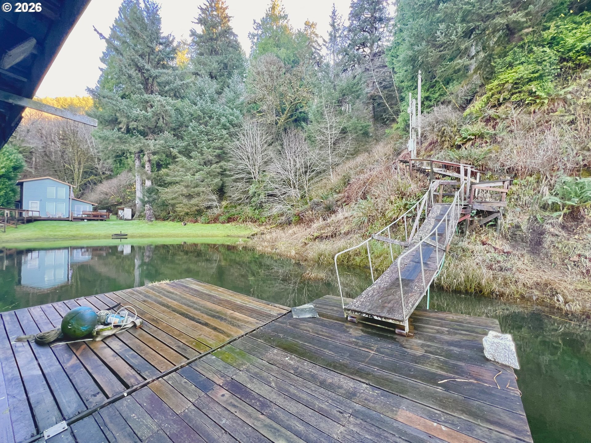 515 North Tenmile Lakeside, OR 97449 - Photo 13 of 20 a view of a wooden floor with a lake