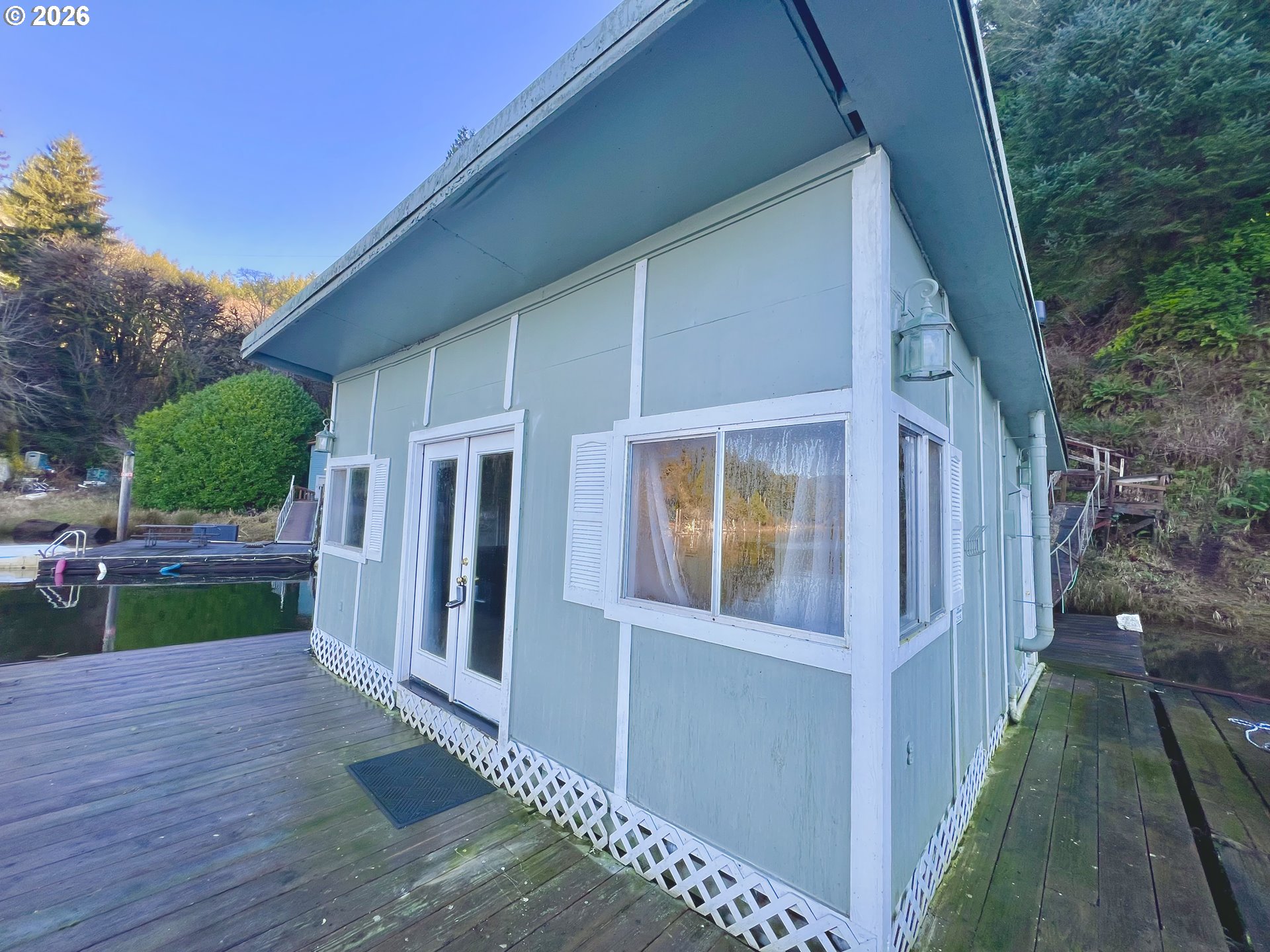 515 North Tenmile Lakeside, OR 97449 - Photo 2 of 20 a view of porch with seating space