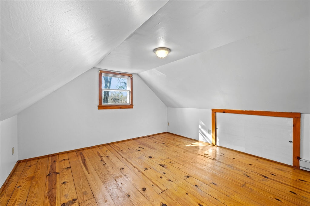 18 Huron Street Springfield, MA 01104 - Photo 21 of 35 a view of an empty room with wooden floor