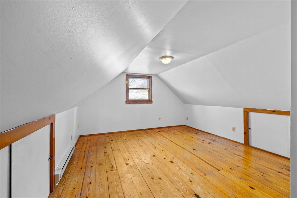 18 Huron Street Springfield, MA 01104 - Photo 23 of 35 a view of empty room with wooden floor