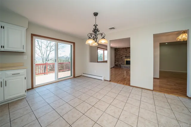 a view of a room and window