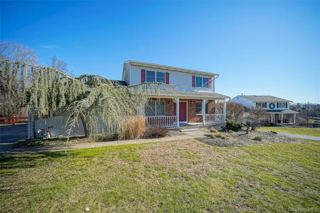 a view of a house with a swimming pool