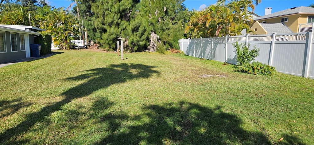 Tennessee Avenue Palm Harbor, FL 34683 - Photo 3 of 10 a view of a yard with plants and trees