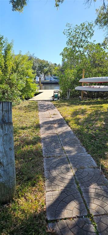 Tennessee Avenue Palm Harbor, FL 34683 - Photo 4 of 10 a view of a swimming pool with an ocean view