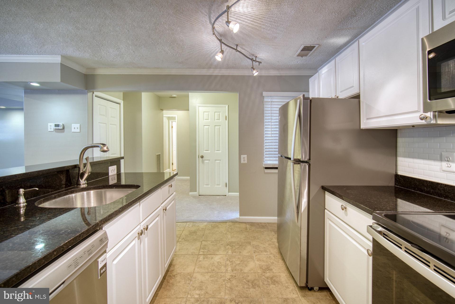 1638 Westwind Way McLean, VA 22102 - Photo 8 of 25 Kitchen has brand new SS appliances