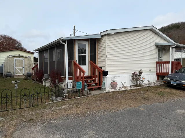 a view of house with a patio