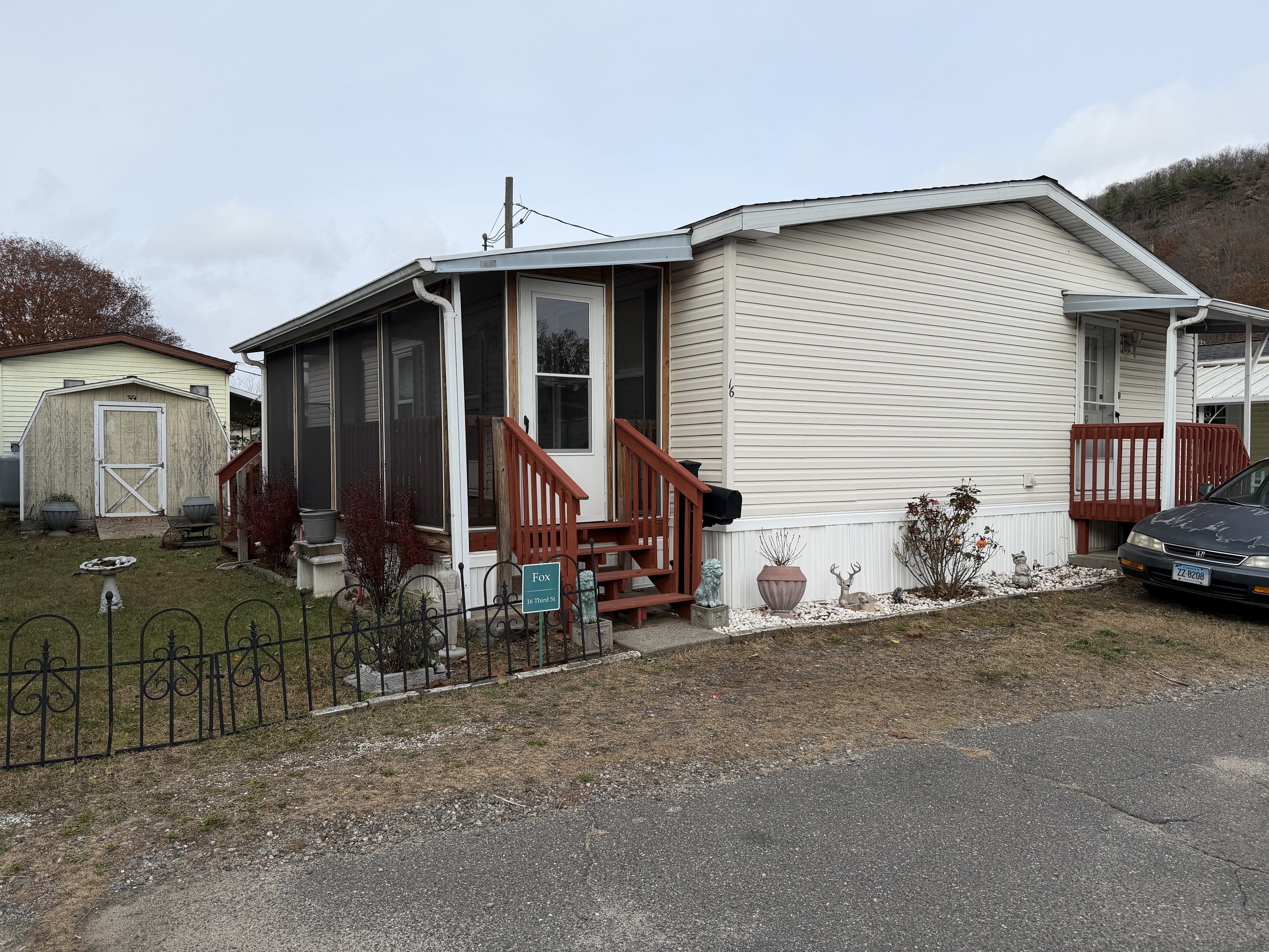 a view of house with a patio