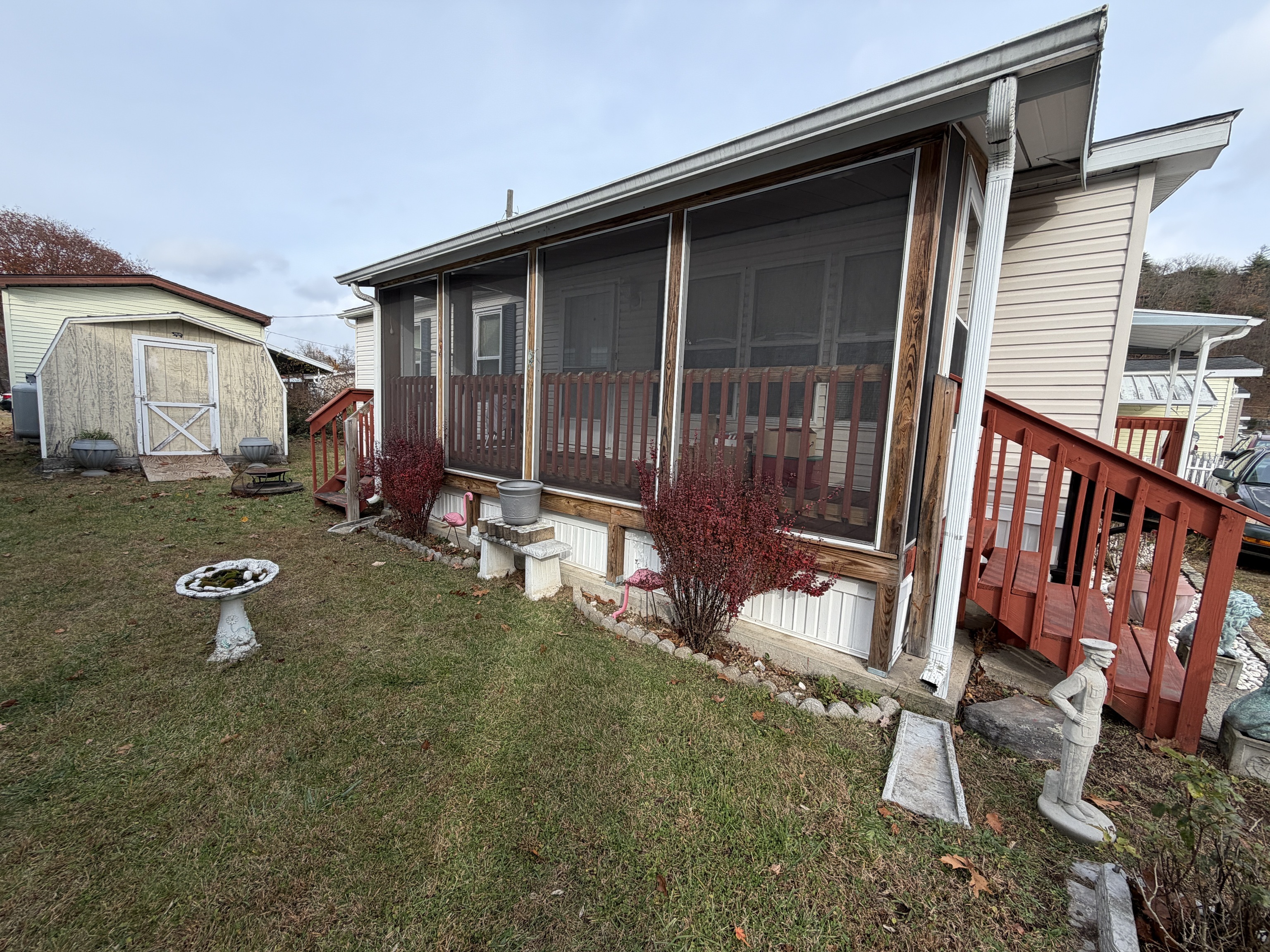 16 3rd Street Beacon Falls, CT 06403 - Photo 3 of 12 a backyard of a house with outdoor seating