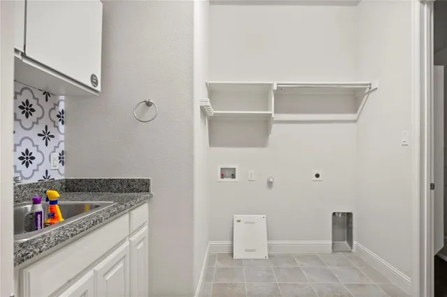 a hallway with washer and dryer