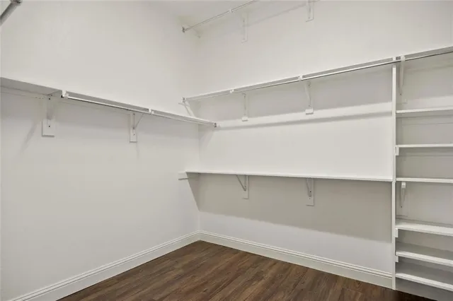 a view of an empty walk in closet