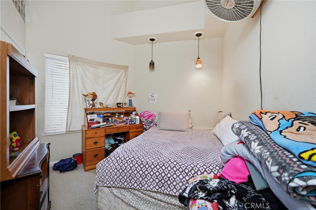 17905 Bunker Road Hidden Valley Lake, CA 95467 - Photo 15 of 28 Bedroom 3 has pendant lights over desk area and artful angles for a decorator touch.