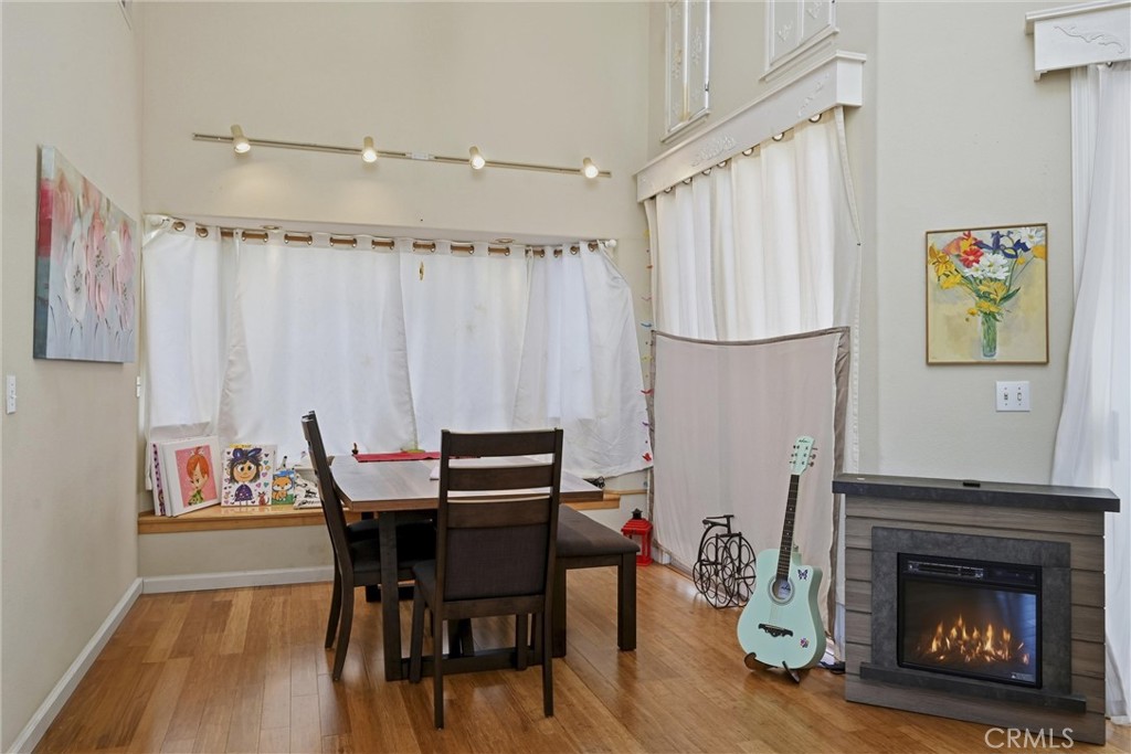 17905 Bunker Road Hidden Valley Lake, CA 95467 - Photo 5 of 28 Dining area has lovely window seat in a bay window, and another extra tall sliding glass door for enchanting views of the Hidden Valley Lake golf course.