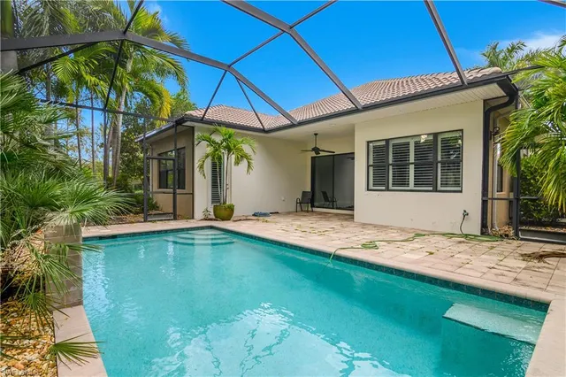 a view of a house with a swimming pool