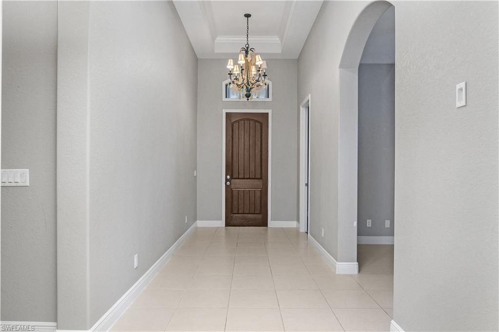 1558 Serrano Circle Naples, FL 34105 - Photo 4 of 31 a view of a windows in a room