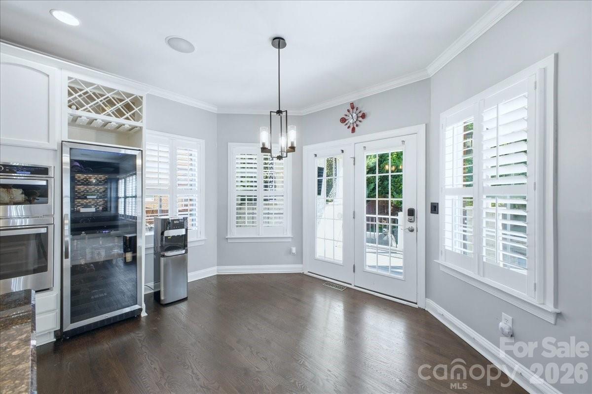 1825 Laveta Road Charlotte, NC 28269 - Photo 16 of 48 a view of an empty room with glass door