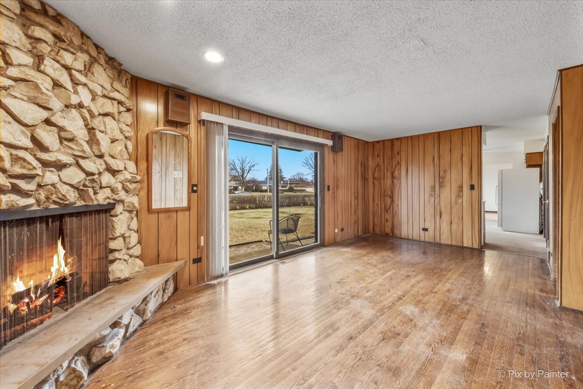 1100 South Church Road Mount Prospect, IL 60056 - Photo 14 of 50 a view of an empty room with a fireplace