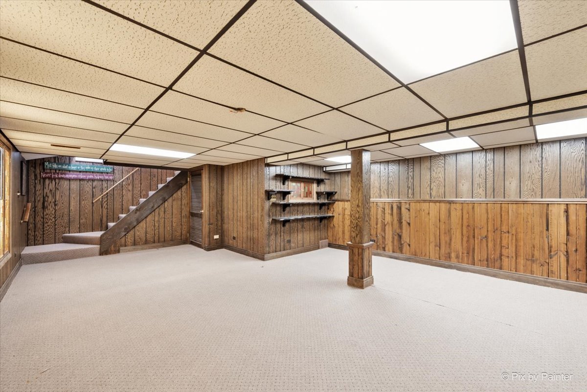1100 South Church Road Mount Prospect, IL 60056 - Photo 28 of 50 a view of empty room with wooden walls