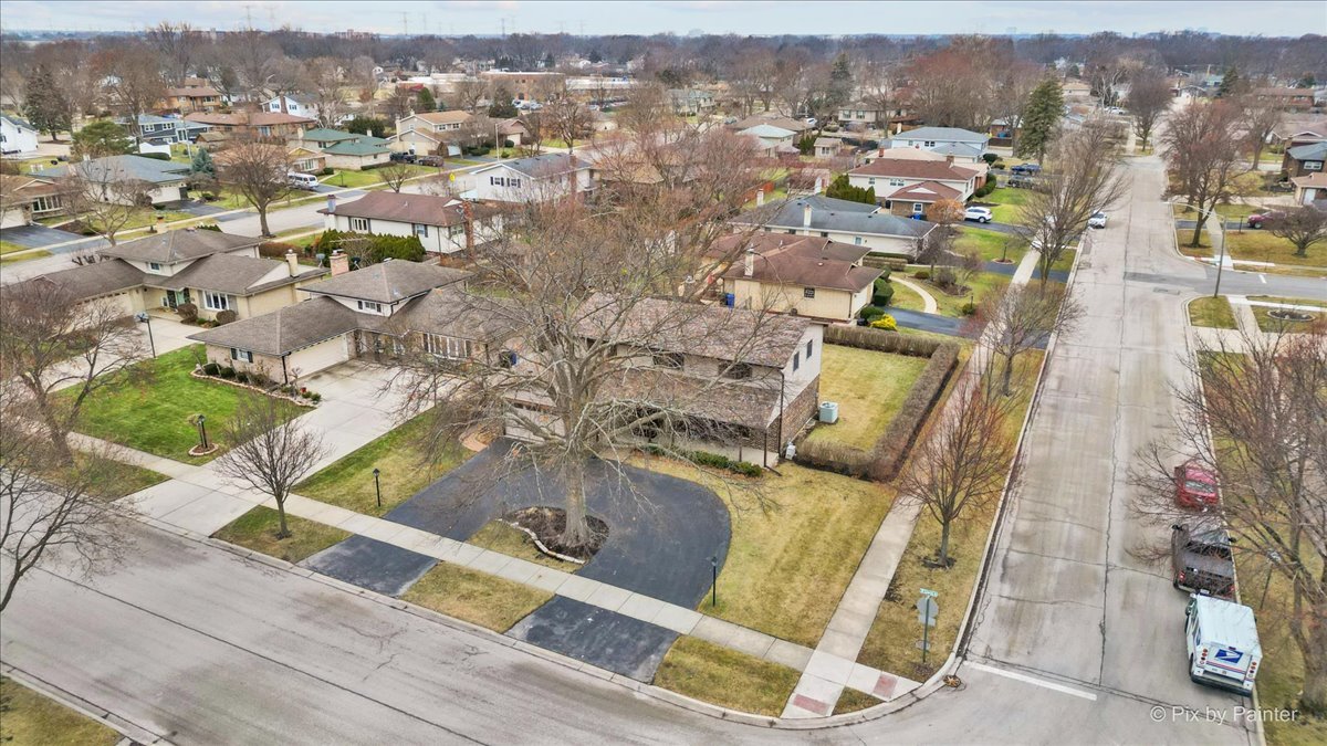 1100 South Church Road Mount Prospect, IL 60056 - Photo 34 of 50 an aerial view of residential houses with outdoor space