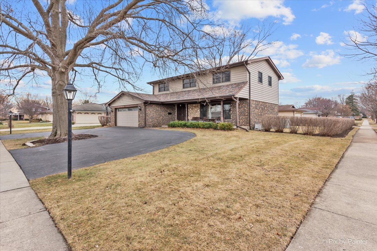 1100 South Church Road Mount Prospect, IL 60056 - Photo 35 of 50 a front view of a building with a yard