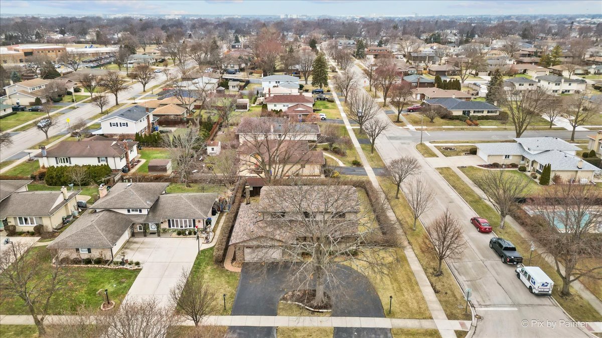 1100 South Church Road Mount Prospect, IL 60056 - Photo 38 of 50 an aerial view of residential houses with outdoor space