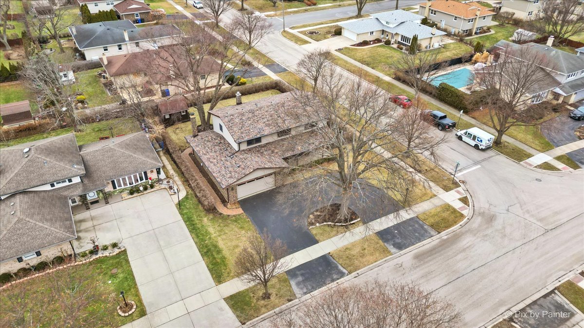 1100 South Church Road Mount Prospect, IL 60056 - Photo 40 of 50 an aerial view of a house with a yard