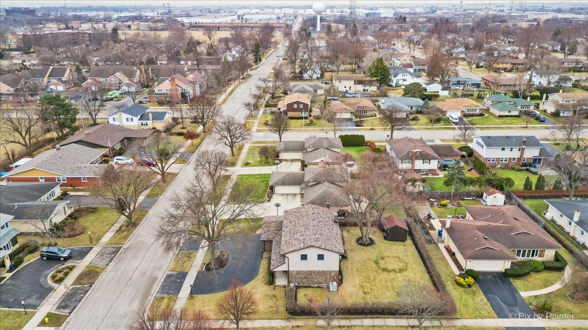 1100 South Church Road Mount Prospect, IL 60056 - Photo 42 of 50 an aerial view of residential houses with outdoor space