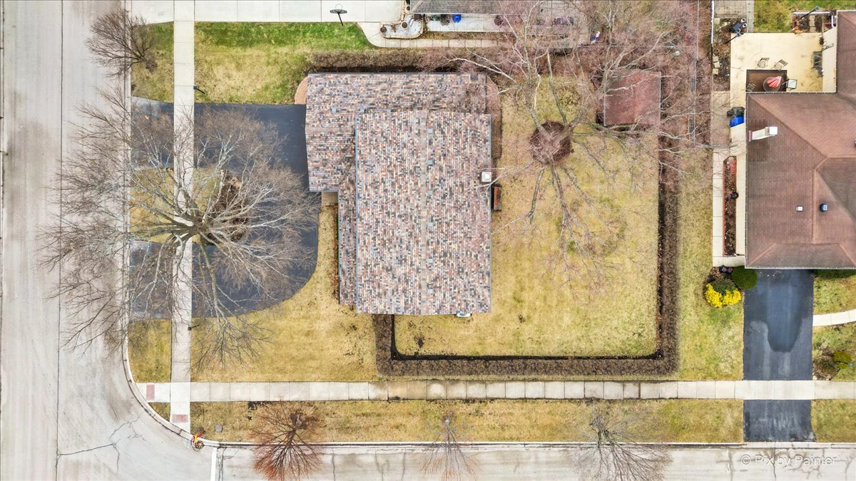 1100 South Church Road Mount Prospect, IL 60056 - Photo 46 of 50 a bathroom with a granite countertop shower and a mirror