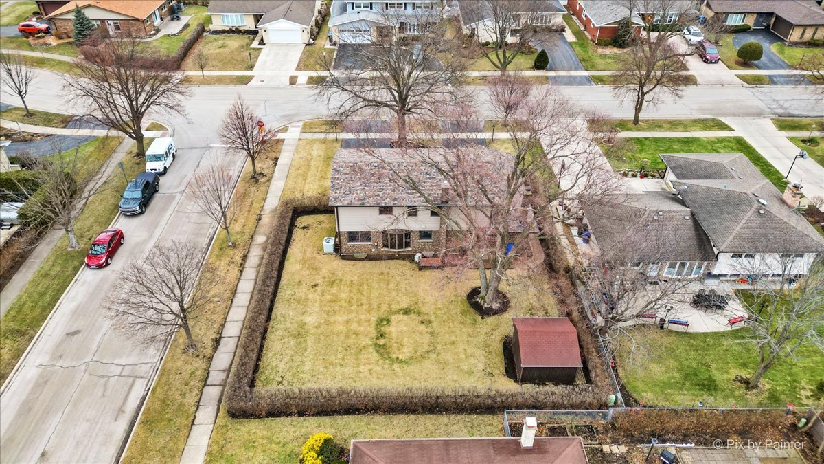 1100 South Church Road Mount Prospect, IL 60056 - Photo 49 of 50 a view of swimming pool with a yard and seating area