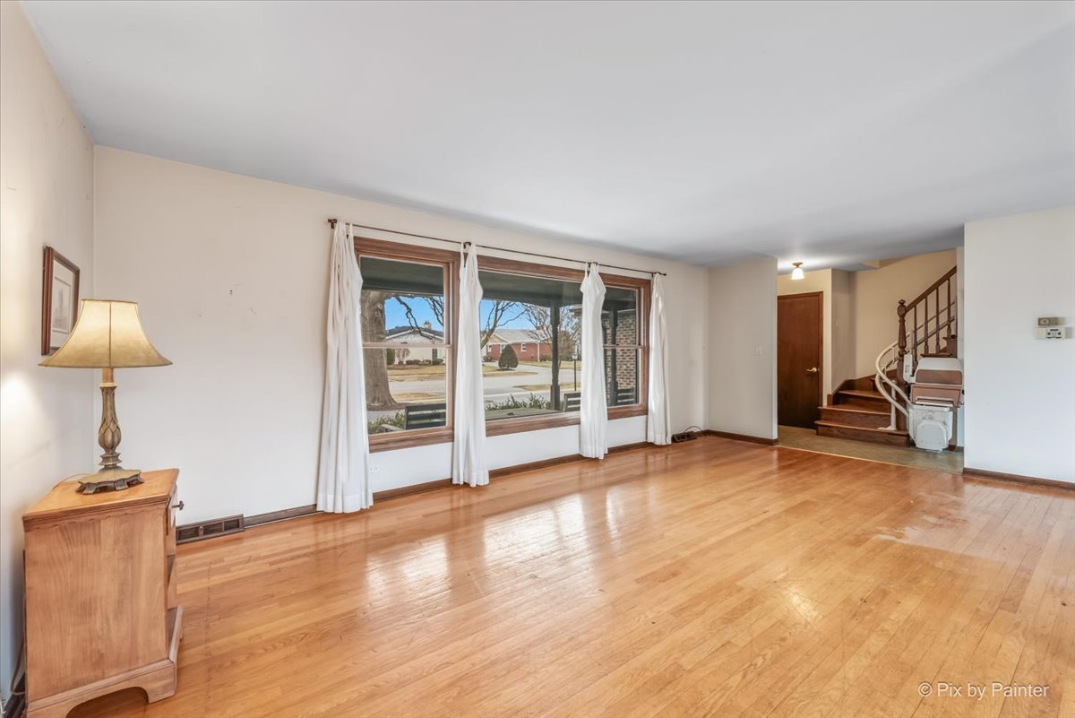 1100 South Church Road Mount Prospect, IL 60056 - Photo 5 of 50 a view of a room with gym equipment and a large window